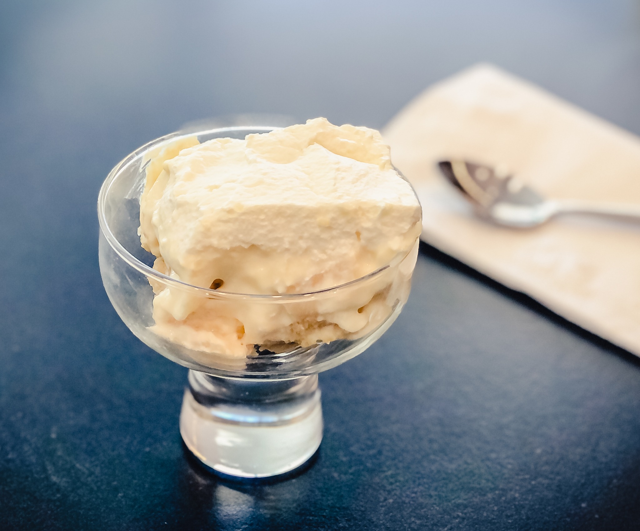 Glass dessert dish with homemade banana pudding in it.